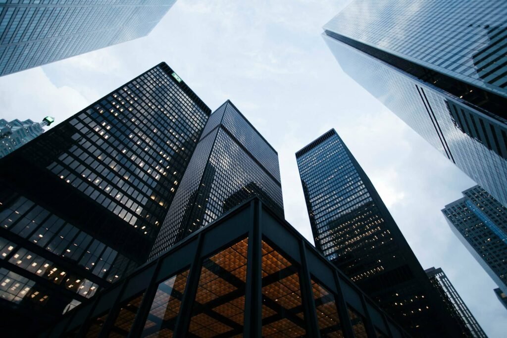 Low angle photo of city high rise buildings during daytime